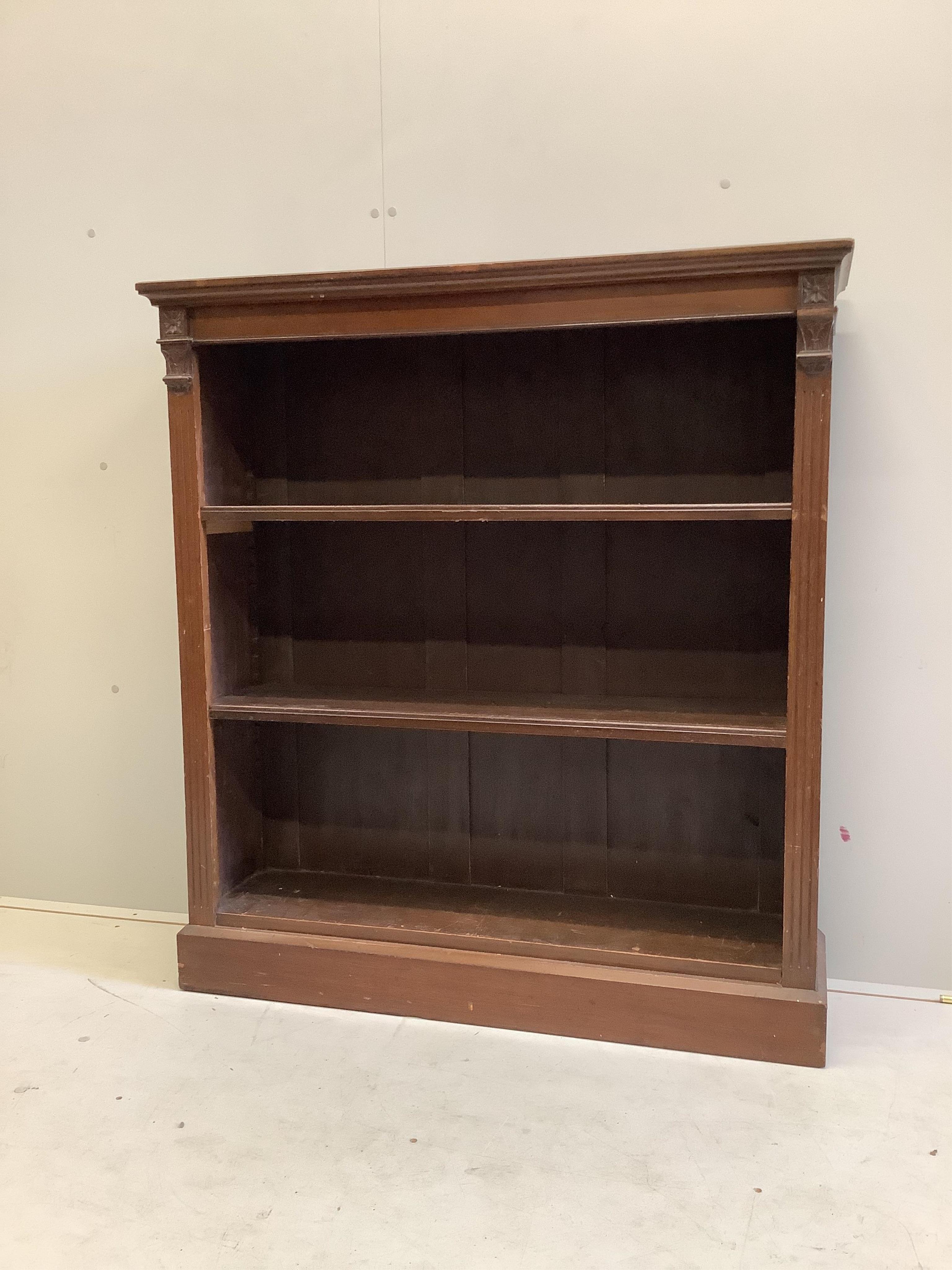 A late Victorian mahogany open bookcase, width 107cm, depth 30cm, height 117cm. Condition - fair